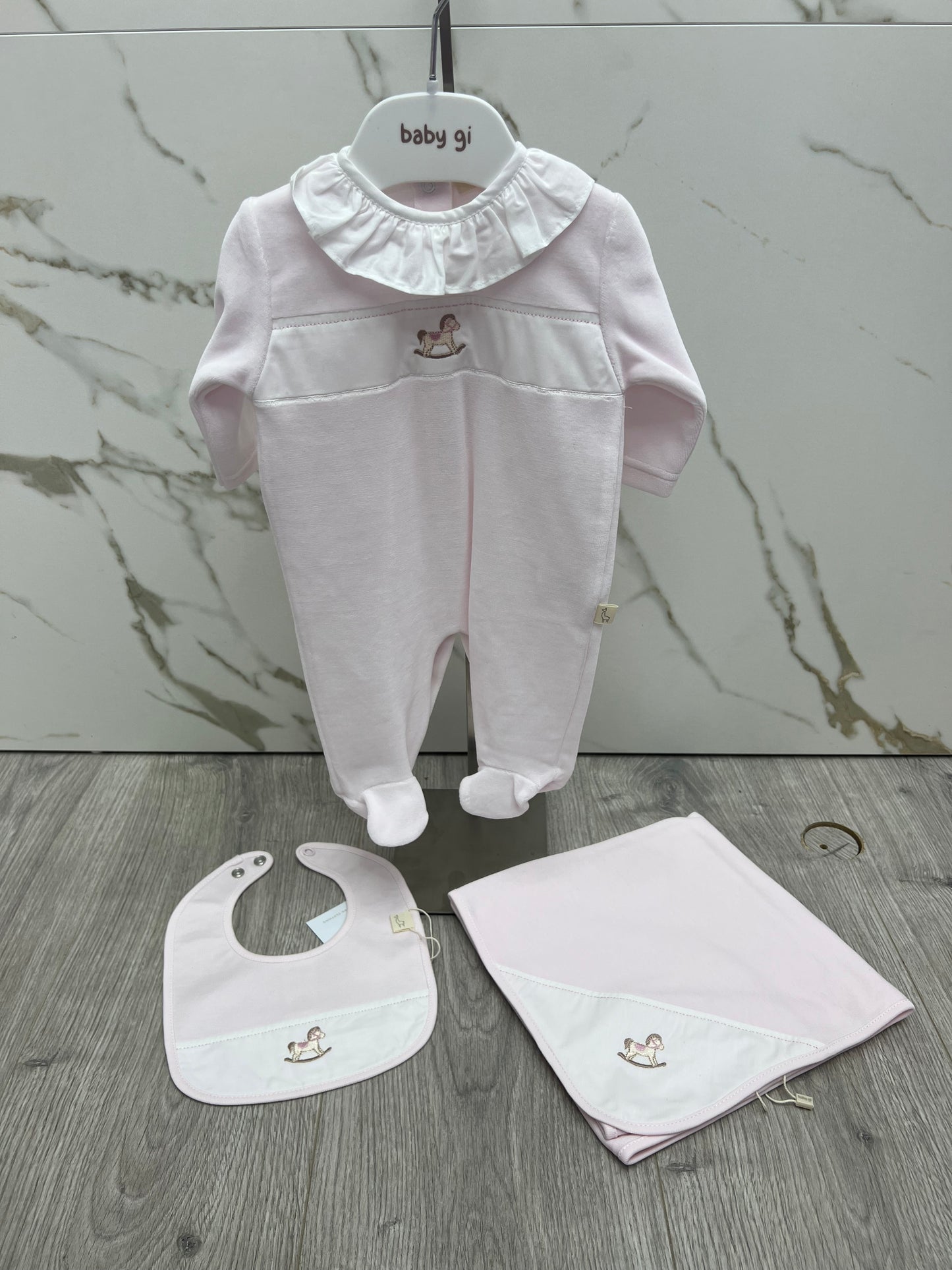 Baby gi AW25 - pink velour rocking horse babygrow