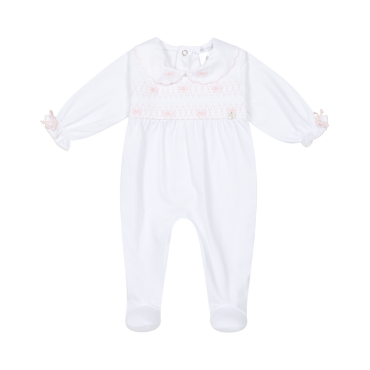 Deolinda 26112 - lollipop white smocked babygrow with pink bow detail